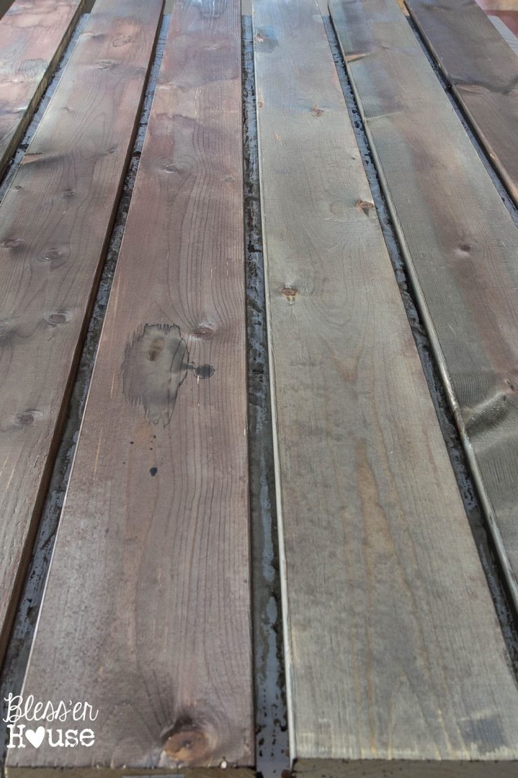 This is the most natural and inexpensive way to stain wood. It's made of 0000 grade steel wool, apple cider vinegar and tea bags. You could use such stain on any wood. It's perfect to make weathered plank accent walls. (via blesserhouse)