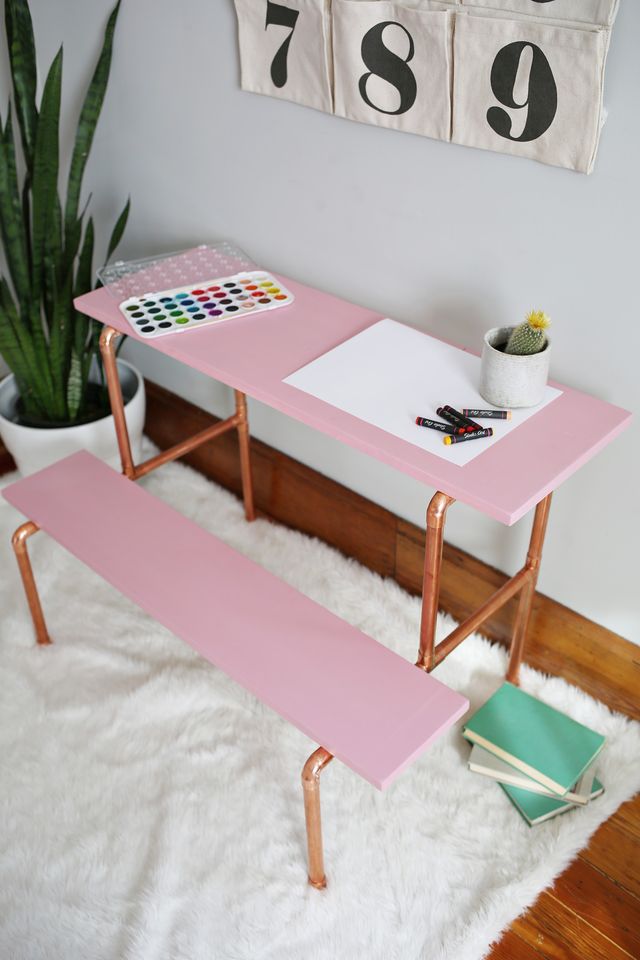 DIY pink and copper pipe desk