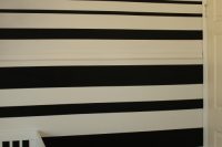 DIY black and white stripe stencil wall