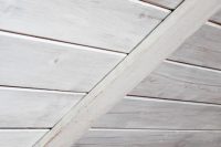 DIY whitewashed wooden plank ceiling