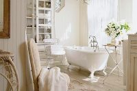 02 romantic white bathroom with wood plank floor