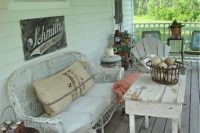 05 shabby chic porch decorated with weathered and whitewashed wood