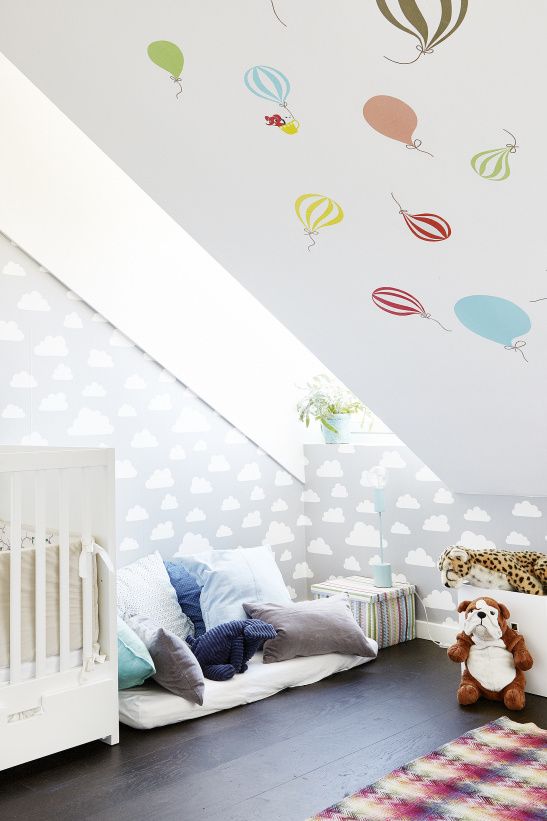 colorful attic kids' room with cute prints