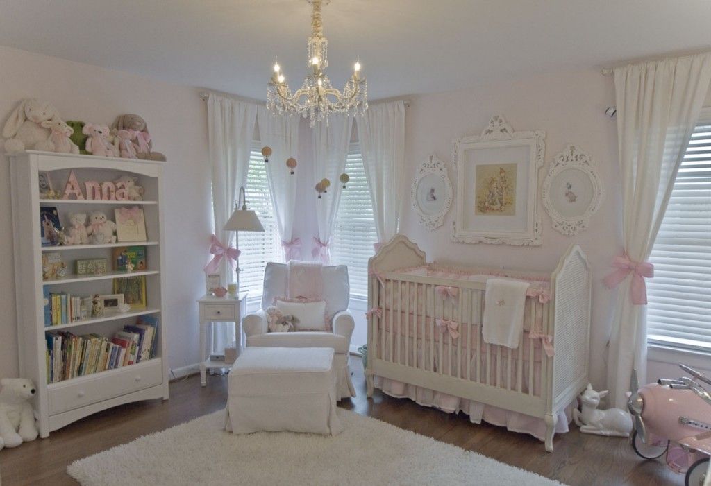 white shabby chic nursery with pink decorations