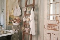 08 shabby chic bathrom with brick floors and a ladder as a shelf