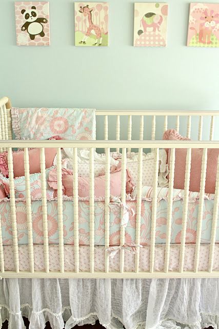 blush and serenity patterned bedding for the crib