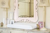 13 distressed grey changing table with a blush framed mirror