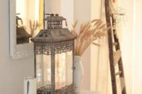 13 white entryway with wooden decor and a vintage metal lantern