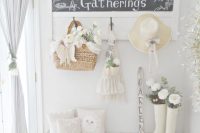 14 shabby chic whitewashed entryway with netural textiles and a chalkboard