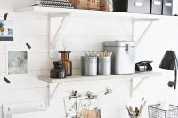 14 wall-mounted storage shelves over the desk