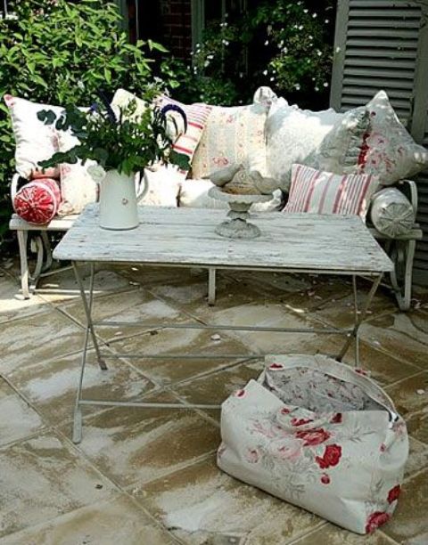 shabby whitewashed terrace table