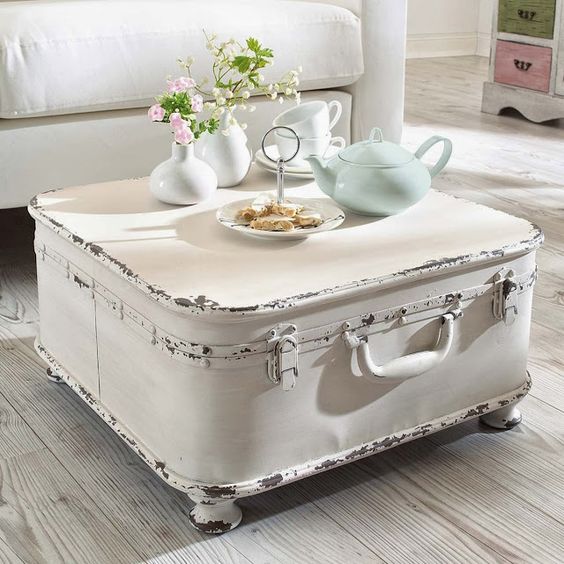 whitewashed shabby suitcase as a coffee table