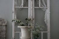 23 an old window can be a cool decoration for a shabby chic entryway