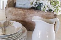 23 rustic and shabby centerpiece in a tool box