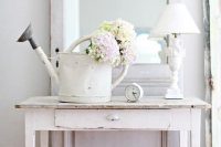 24 a whitewahsed watering can instead of a vase