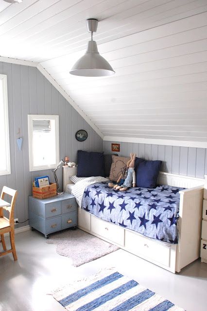 attic boy's room in the shades of blue