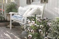 27 lots of potted flowers create an ambience