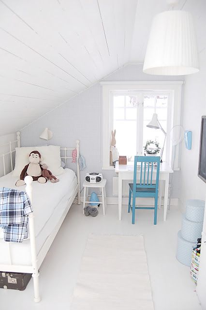 Scandinavian boy's room in the attic