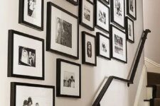 a classic free form black and white gallery wall with pearly matting for a touch of shine and black frames is a cool idea