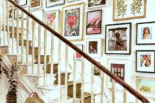a refined gallery wall with lots of art and photos, mismatching frames is a fantastic idea for a bold entryway