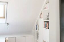 a small and smart attic storage unit with open and closed compartments, cabinets and drawers, is a cool idea