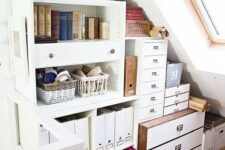 a small attic space with built-in shelves and dressers plus file cabinets, organized with various boxes and baskets is a cool idea