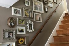 a vintage gallery wall with mismatching frames, photos, art and various types of decor added