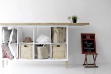 Kallax sideboard hack with IKEA sofa legs and wooden tabletop