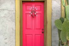 04 fuchsia front door with a gilded frame