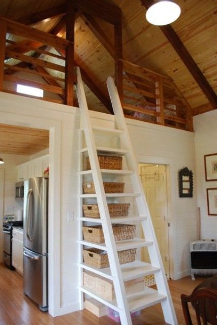 white cottage ladder with cubbies for storage