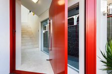 09 bold red oversized pivot door