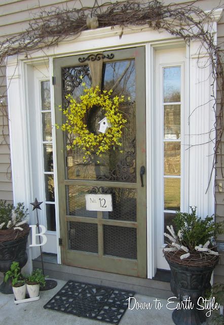 screen front door with white sidelights