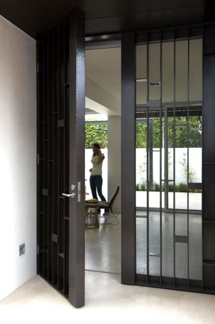 glam metal and mirrored glass front doors