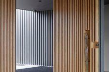 14 minimalist and sculptural wooden entry door