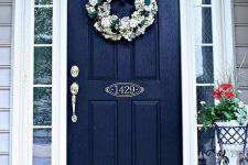 19 black weathered door with white sidelights