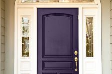 19 dark purple front door with gilded details