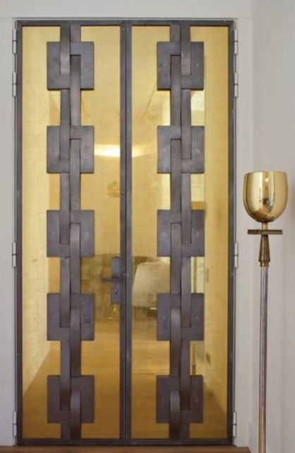 brass and grey modern front doors