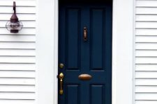 21 navy front door with a white frame