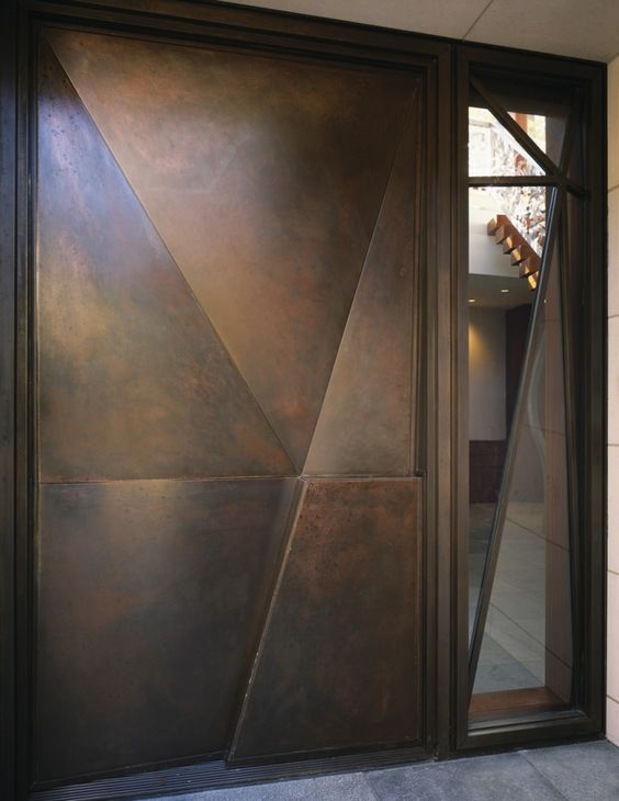 modern geometric dark steel front door