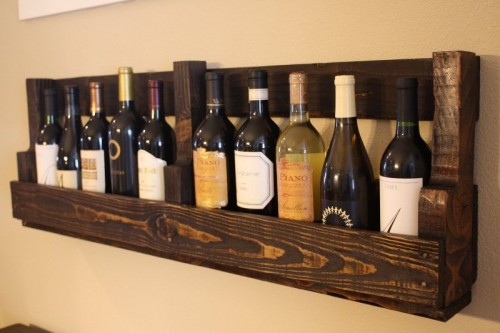 DIY vintage-looking wine rack of pallets (via www.shelterness.com)