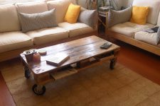 DIY stained pallet coffee table on casters