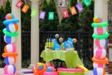 04 drink table with bold decor and beach ball pillars on the sides