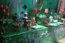 06 mermaid-style pool party dessert table in green