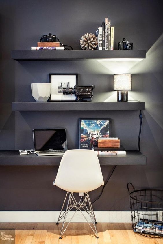 modern grey study space with a shelf used as a desk
