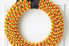 09 candy corn wreath with black ribbon