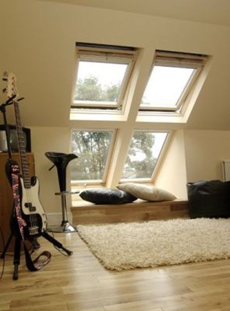 modern and laconic seating area by the attic window