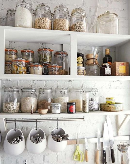 open shelving with jars for storing dry foods