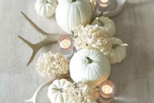 13 all-white centerpiece with antlers, flowers and pumpkins