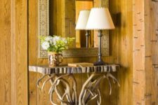 14 antler console table legs for a cabin entryway