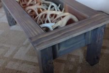 17 antlers display inside a coffee table